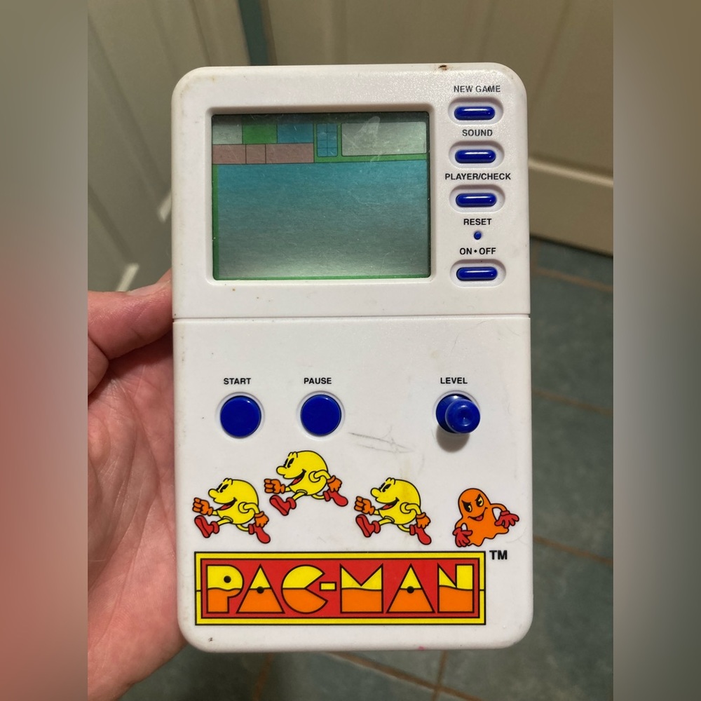 Vintage handheld Pac-Man game